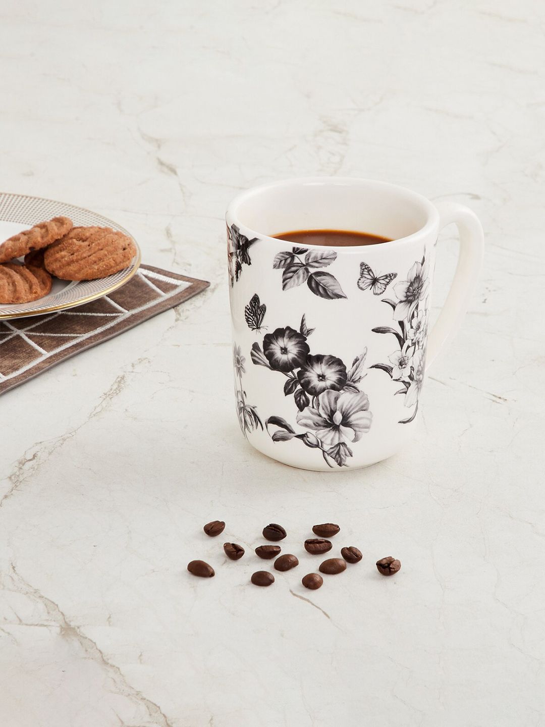 Home Centre White & Black Printed Stoneware Glossy Cups Set of Cups and Mugs Price in India