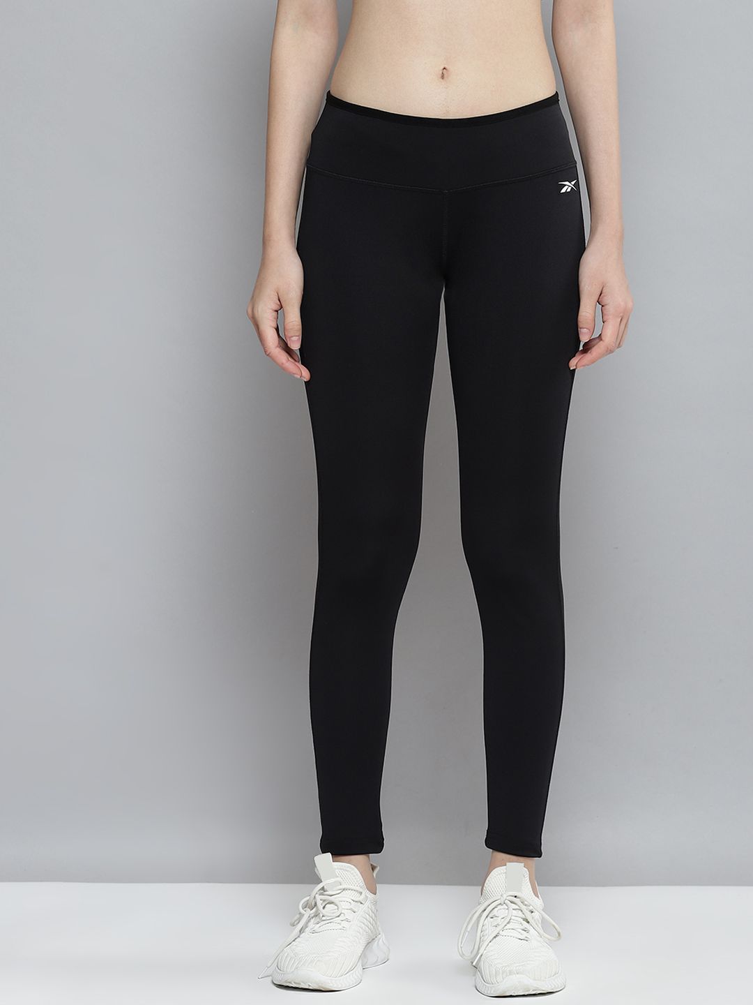 Reebok Women Black FND Solid Training Tights Price in India