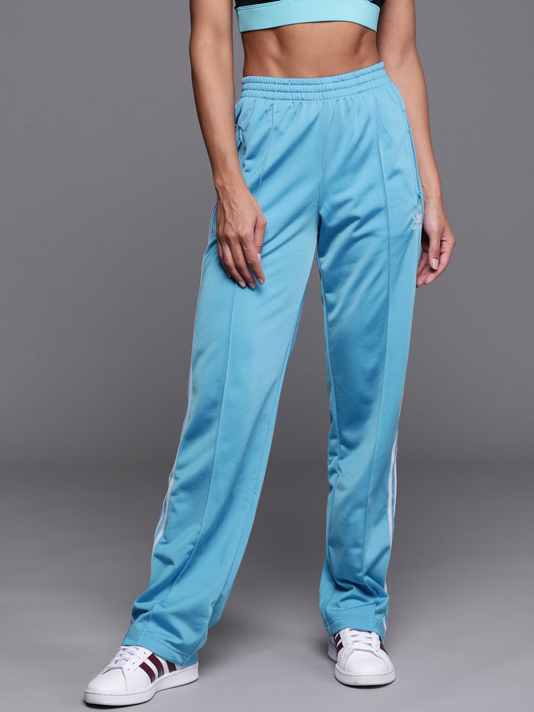 ADIDAS Originals Women Blue Firebird Solid Sustainable Track Pants Price in India