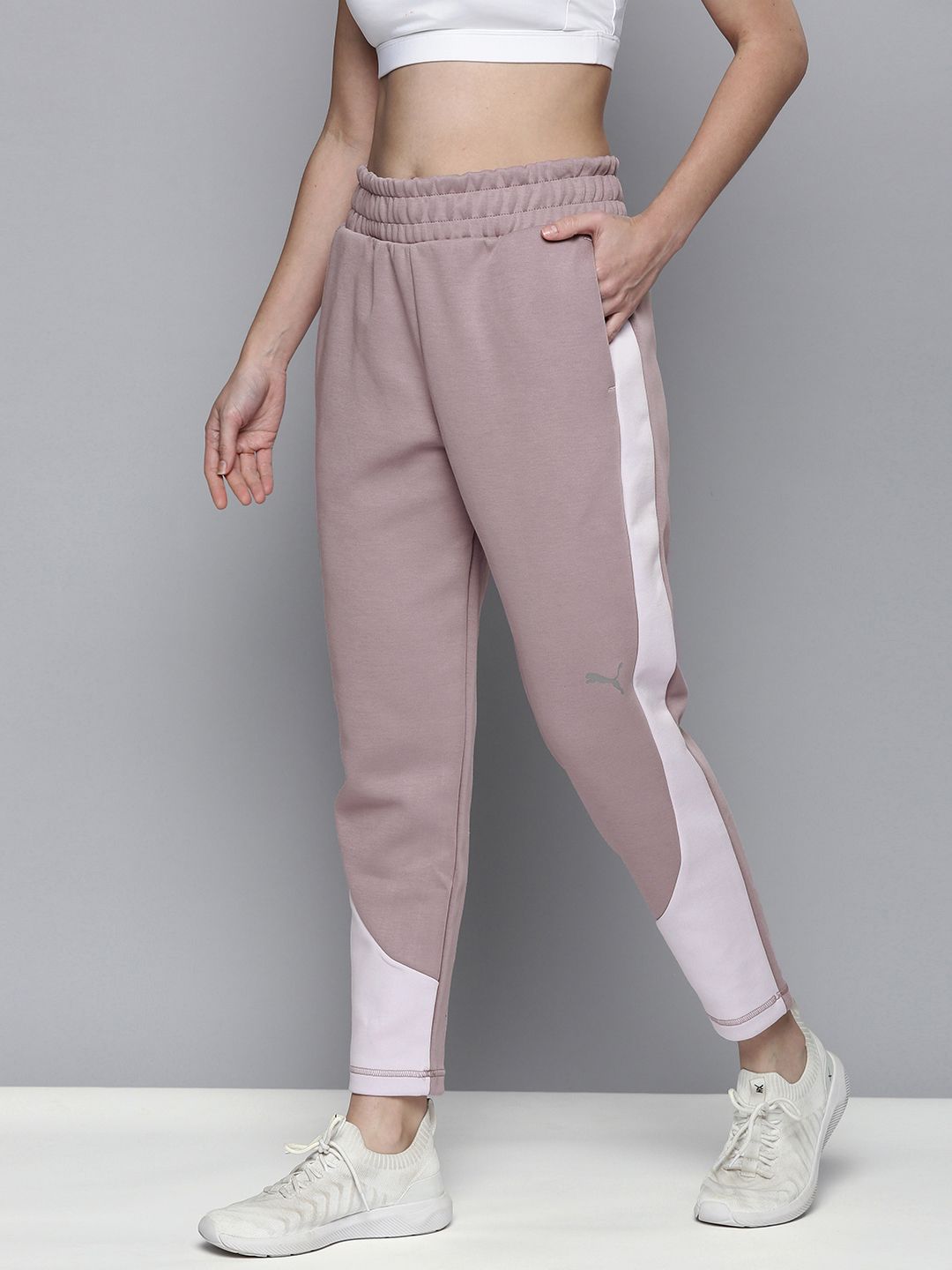 Puma Women Quail Violet & White Solid dryCell Technology Sides Evostripe Sustainable Sustainable Track Pants Price in India