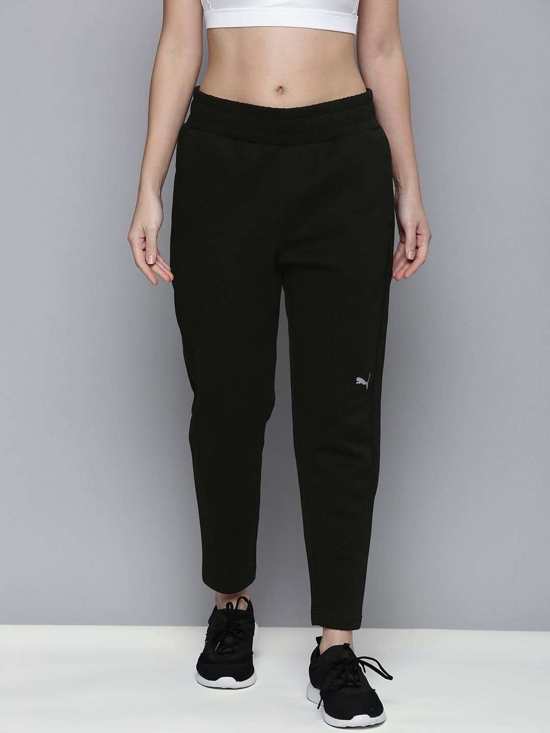 Puma Women Black Solid Double Knitted Mid-Rise dryCell Technology Evostripe Sustainable Sustainable Track Pants Price in India
