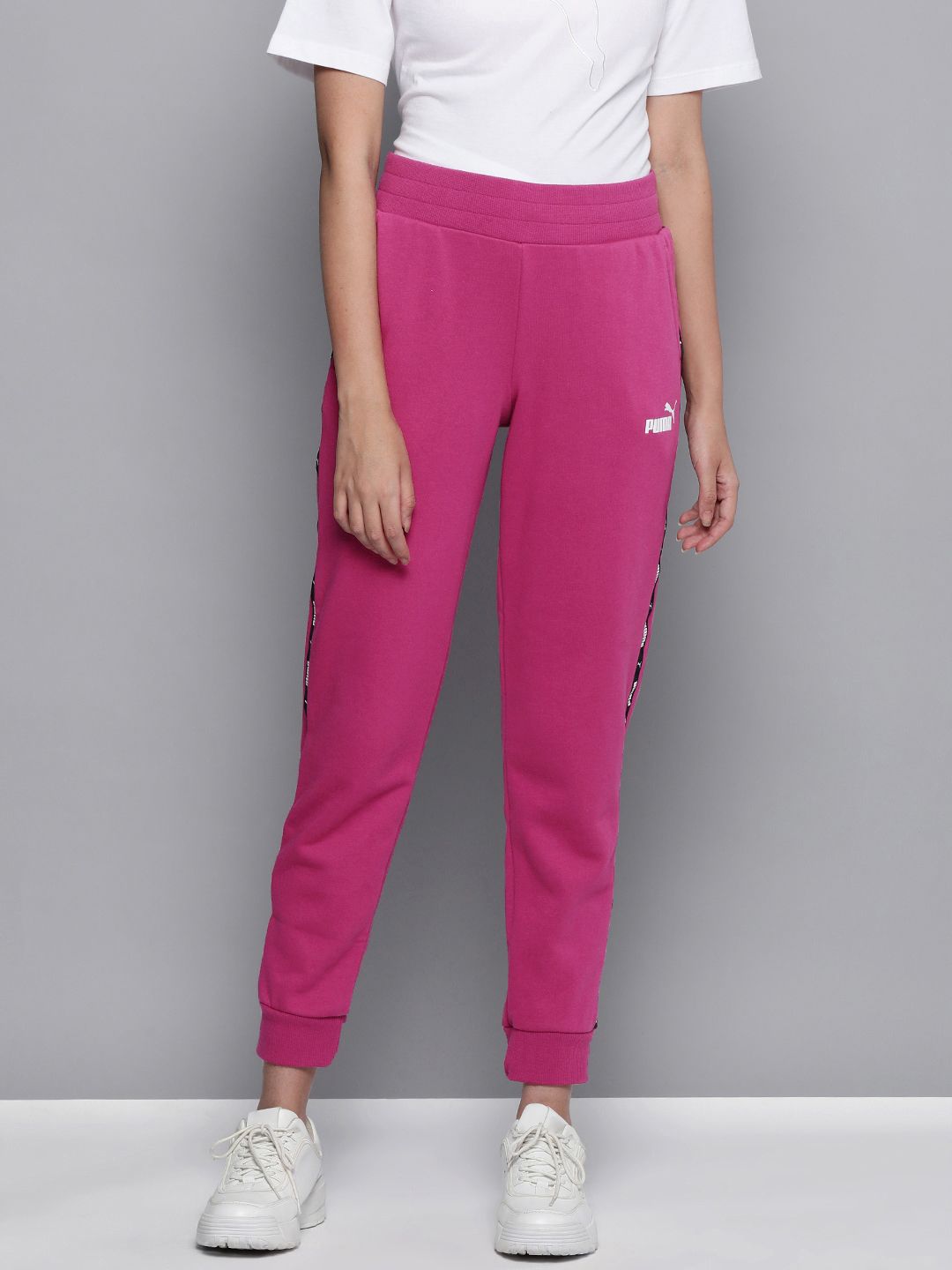 Puma Women Fuchsia Solid Power Tape Sustainable Joggers Price in India