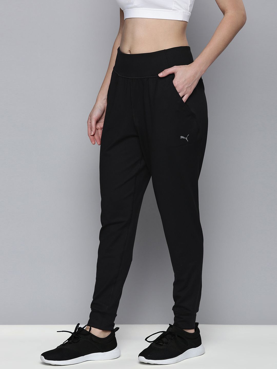 Puma Women Black Solid Knitted Mid-Rise Studio Foundation  Yoga Sustainable Joggers Price in India