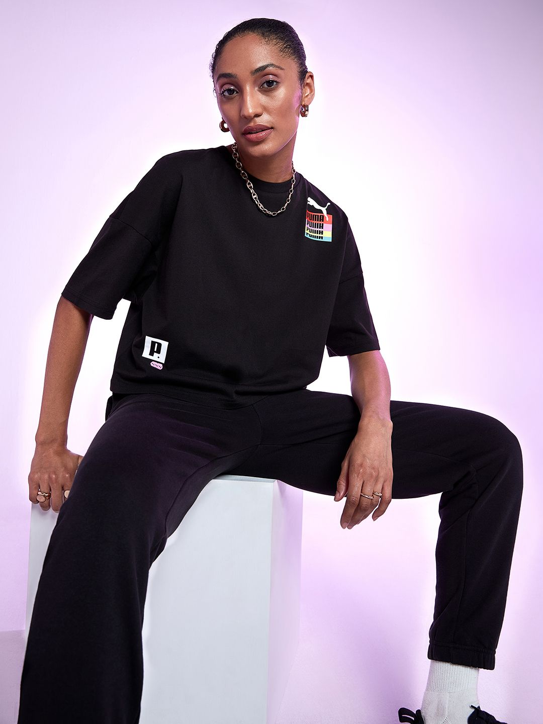 Puma Women Black Brand Logo Printed Extended Sleeves Loose T-shirt Price in India