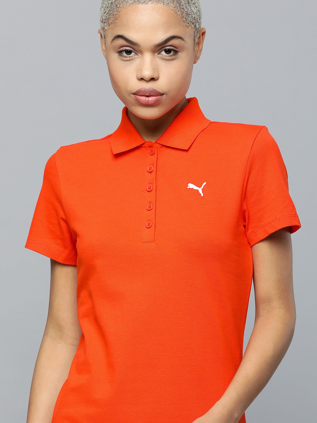 Puma Women Orange Solid Polo Collar T-shirt Price in India