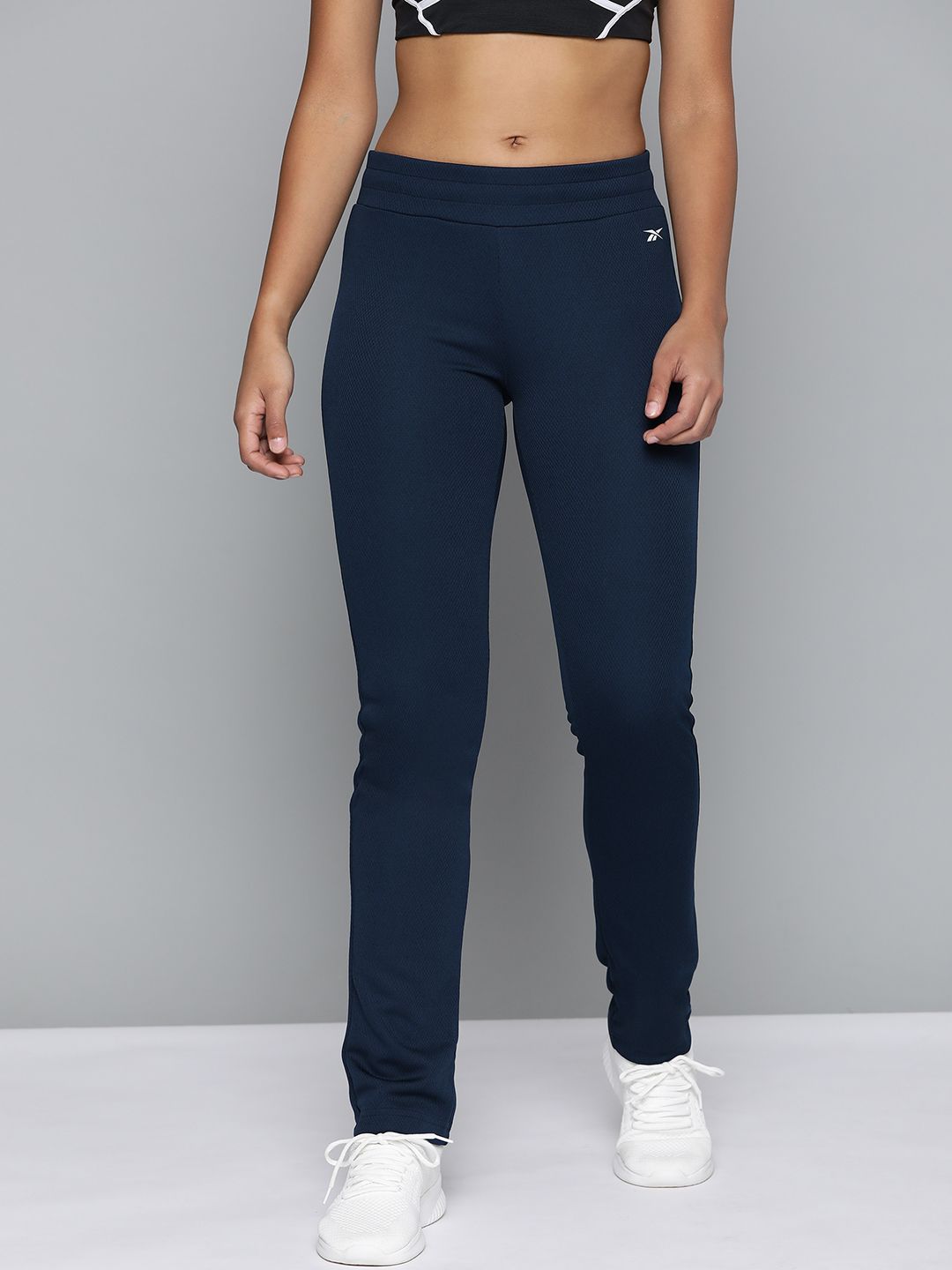 Reebok Women Navy Blue Training Essentials Vector Solid Track Pants Price in India