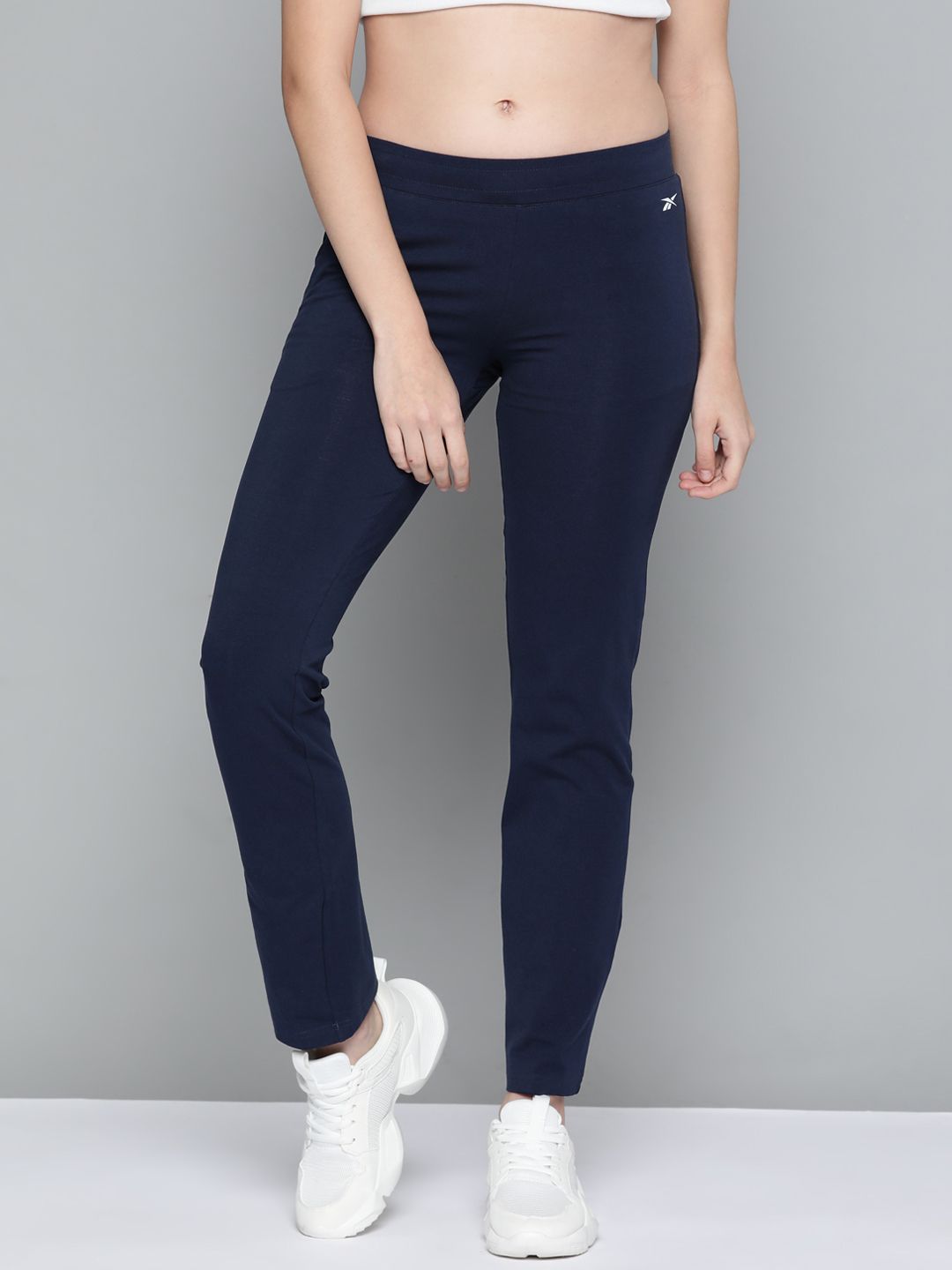 Reebok Women Navy Blue Foundation Solid Training Track Pants Price in India
