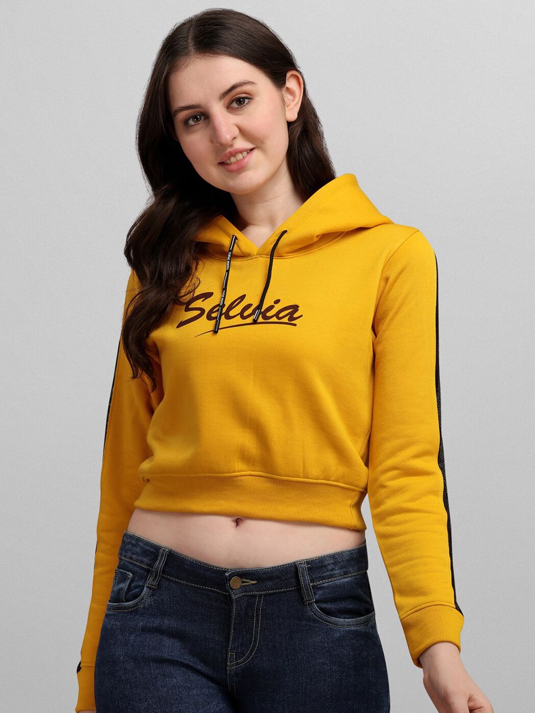 Selvia Women Mustard Yellow & Brown Brand Logo Printed Hooded Sweatshirt Price in India