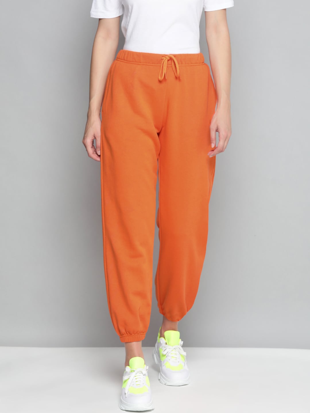 Levis Women Orange Solid Relaxed Joggers Trousers Price in India