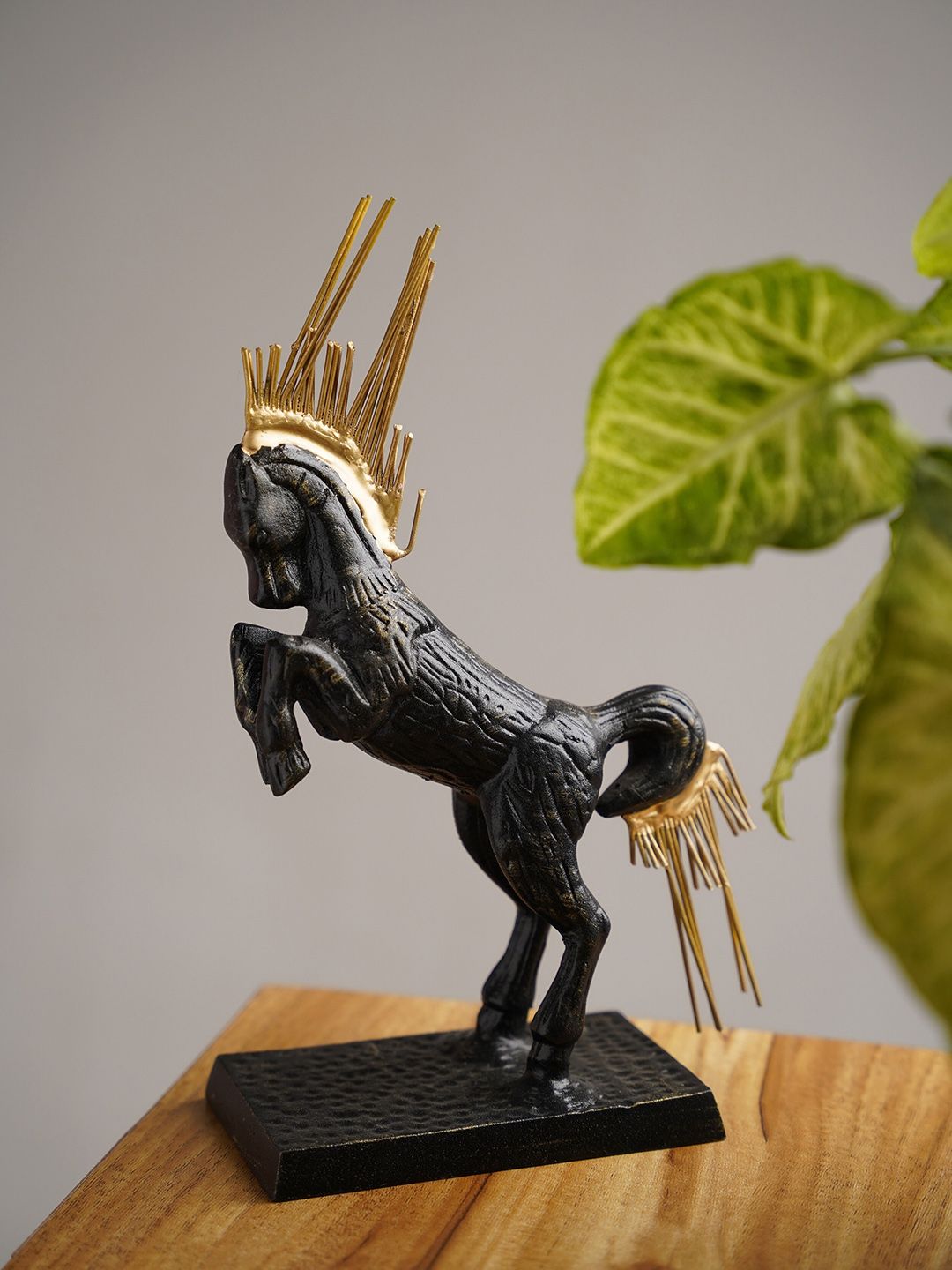 Folkstorys Black & Gold-Toned Metal Horse Figurine Price in India