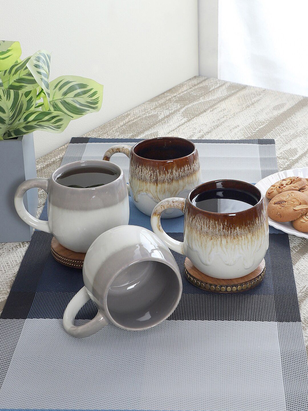 CDI Set Of 4 White & Brown Textured Ceramic Glossy Cups Price in India