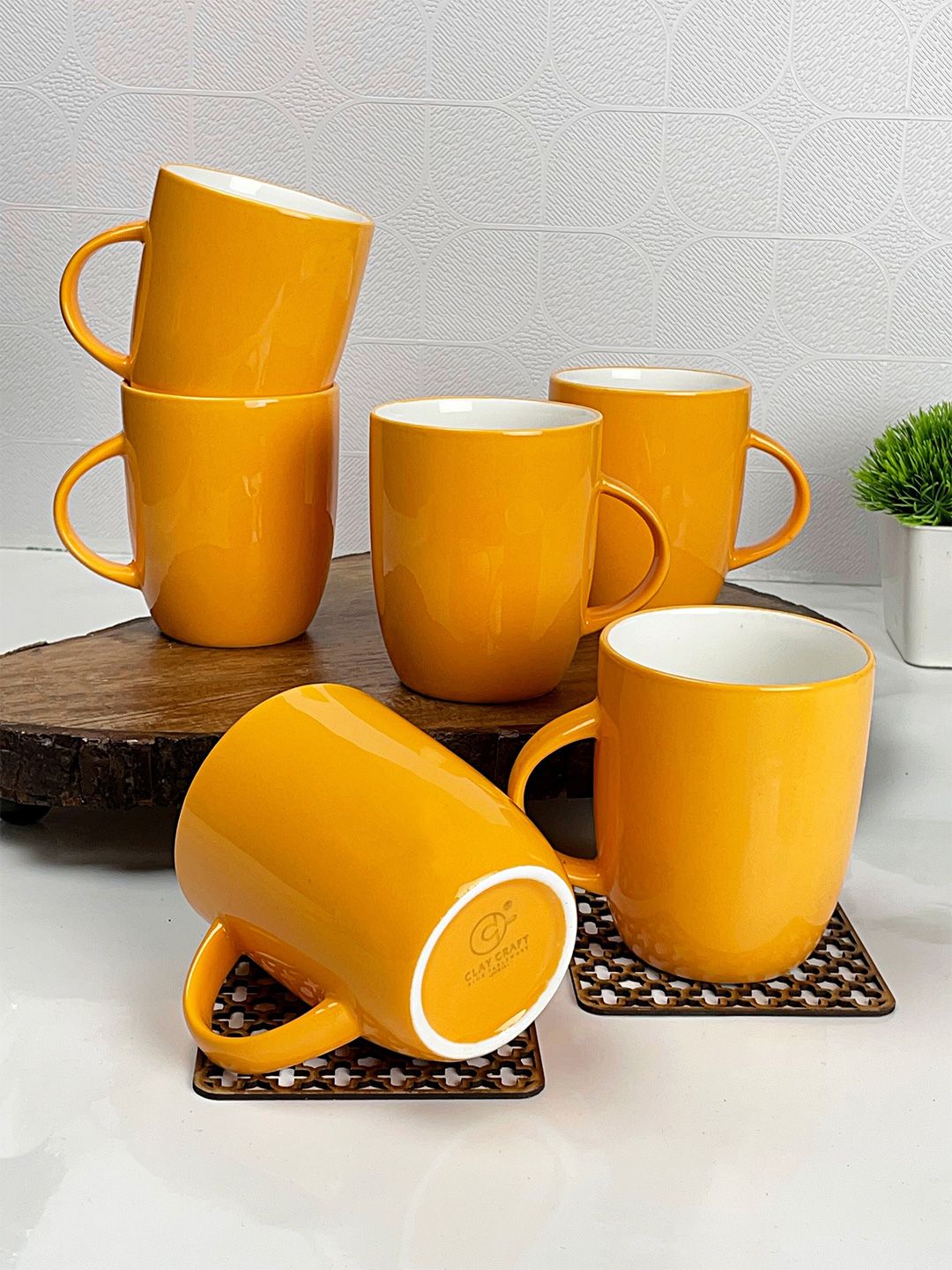 CLAY CRAFT Set Of 6 Orange & White Solid Ceramic Glossy Mugs Price in India
