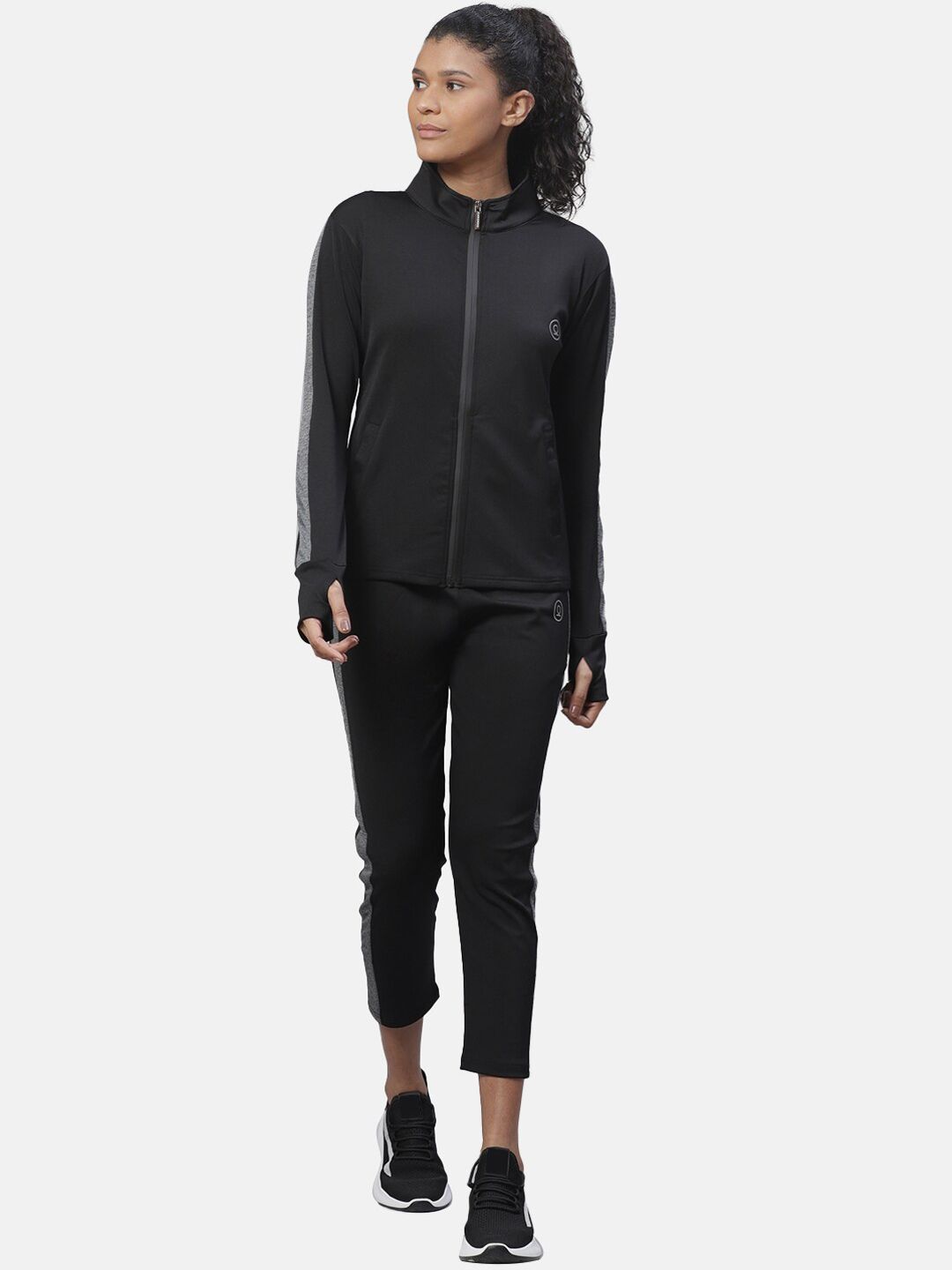 Chkokko Women Black Solid Tracksuit Price in India