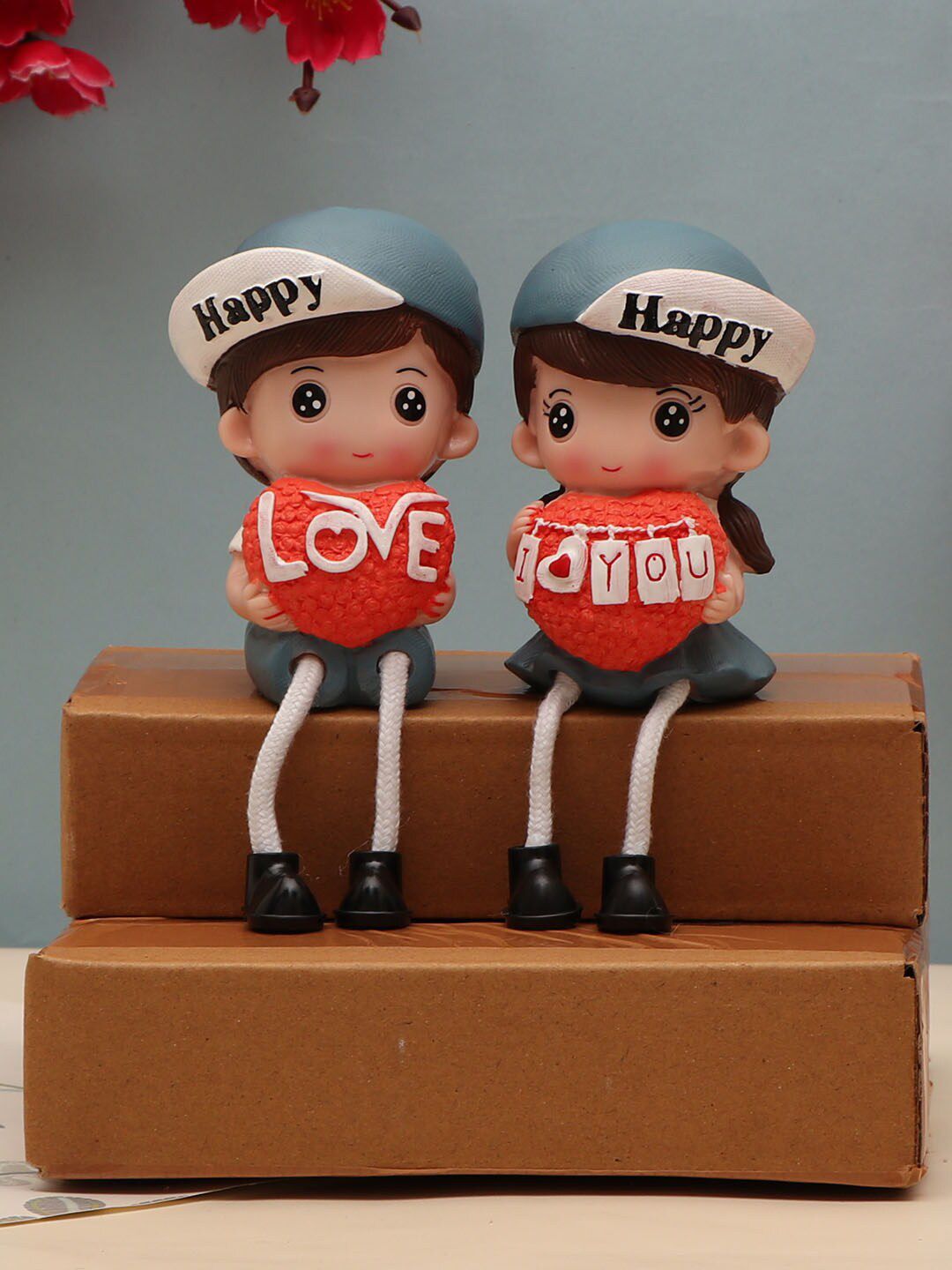 TIED RIBBONS Brown & Orange Valentine Romantic Long Leg Love Couple Showpiece Price in India