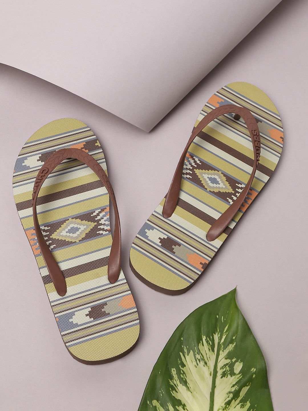 CHUPPS Women Kaleen Kilim Olive Green & Yellow Printed Natural Rubber Thong Flip-Flops Price in India