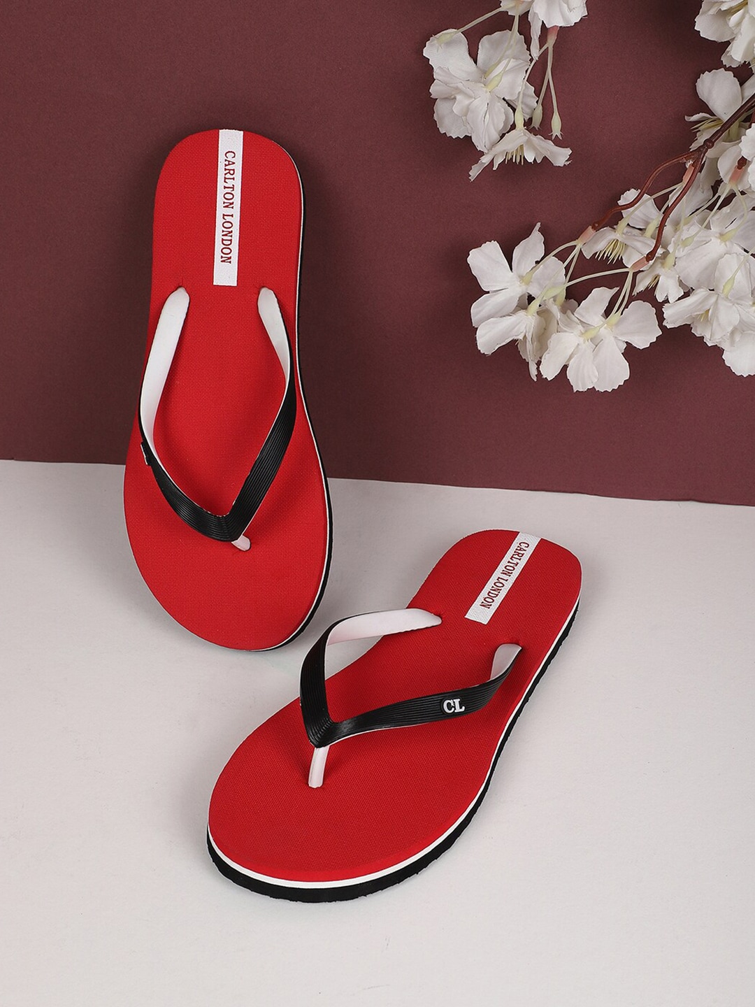 Carlton London Women Red Solid Thong Flip Flops Price in India