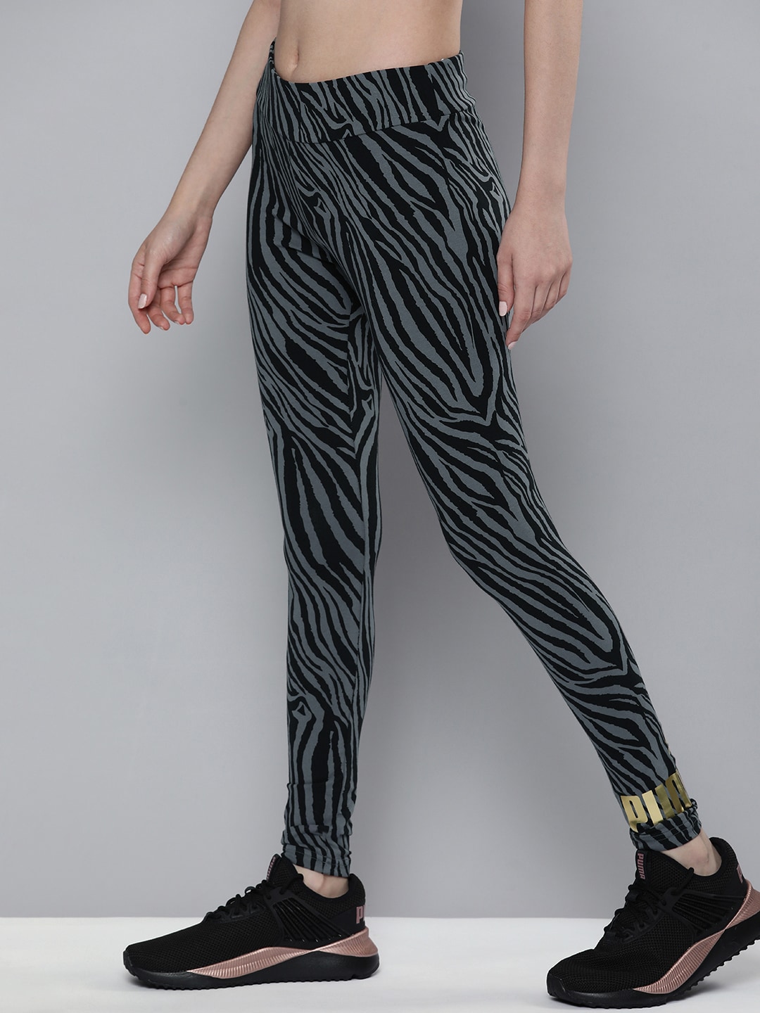 Puma Women Black And Grey Animal Printed Mid-Rise Tights Price in India