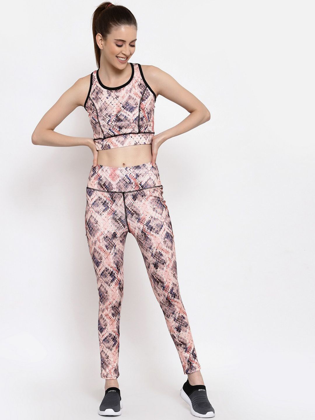 Selvia Women Peach & Blue Printed Slim Fit Knitted Tracksuit Price in India