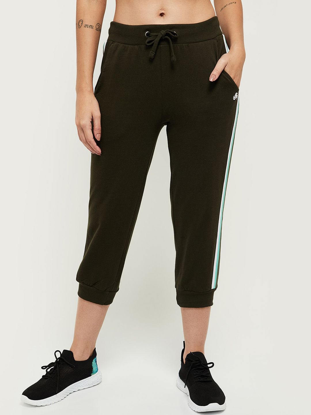 max Women Green Solid Track Pants Price in India