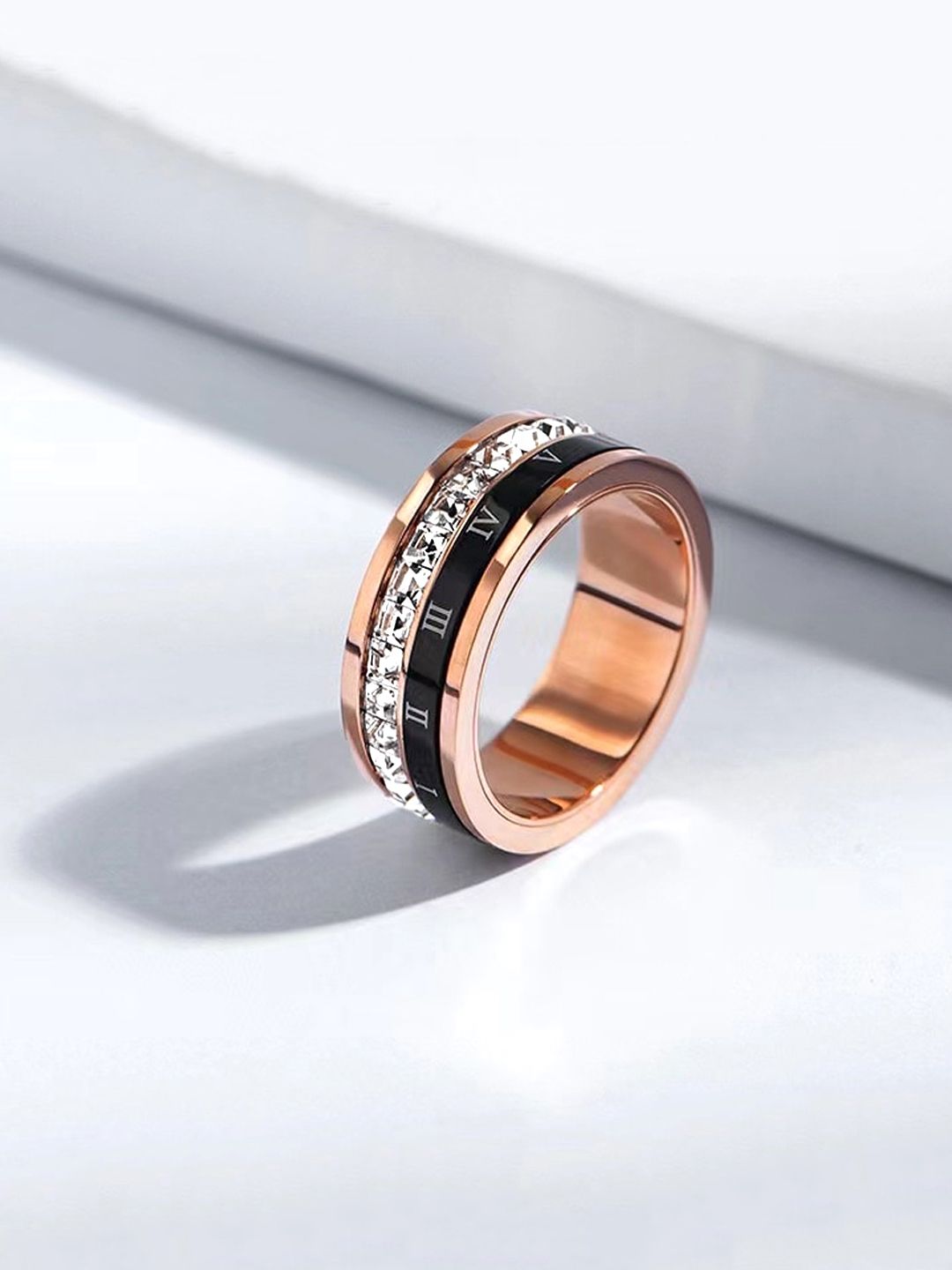 Yellow Chimes Women Rose Gold Toned Spinner Stainless Steel Ring Price in India