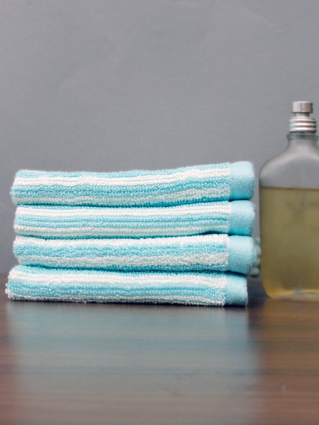 AVI Living Set Of 4 Turquoise Blue & White 600 GSM Striped Face Towels Price in India