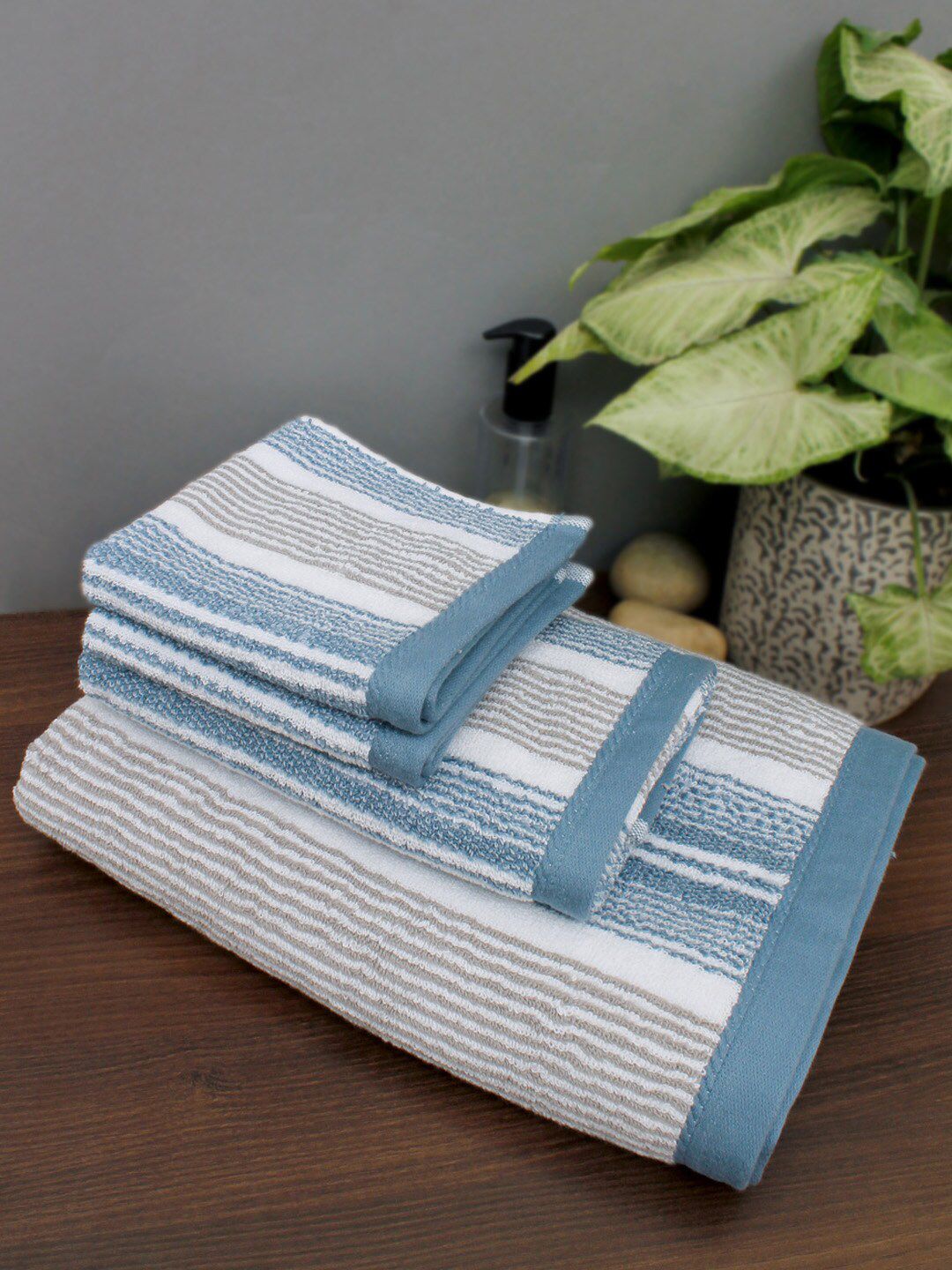 AVI Living Set Of 4 Blue & Grey 600 GSM Striped Towels Price in India