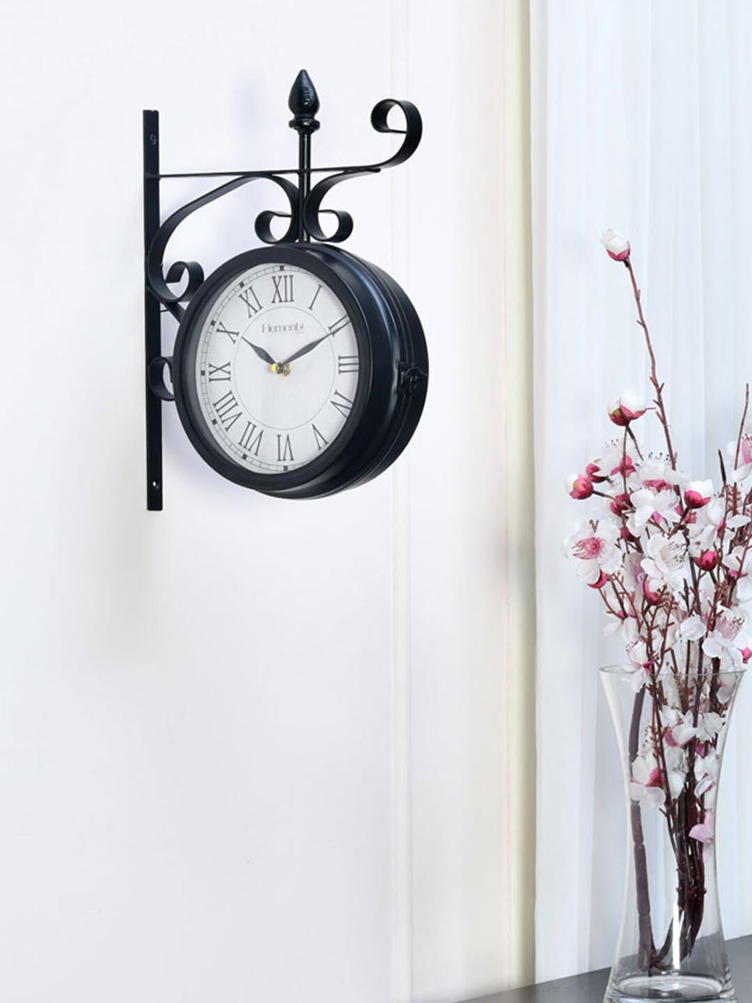 Athome by Nilkamal Black Embellished Contemporary Wall Clock Price in India