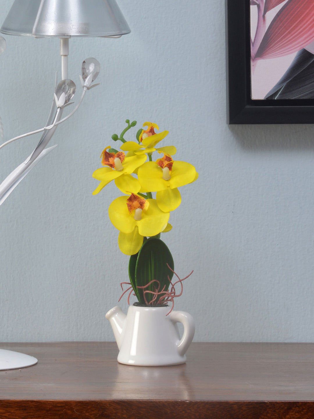Athome by Nilkamal Yellow & Green Artificial Orchid Flower With White Tea Pot Showpiece Price in India