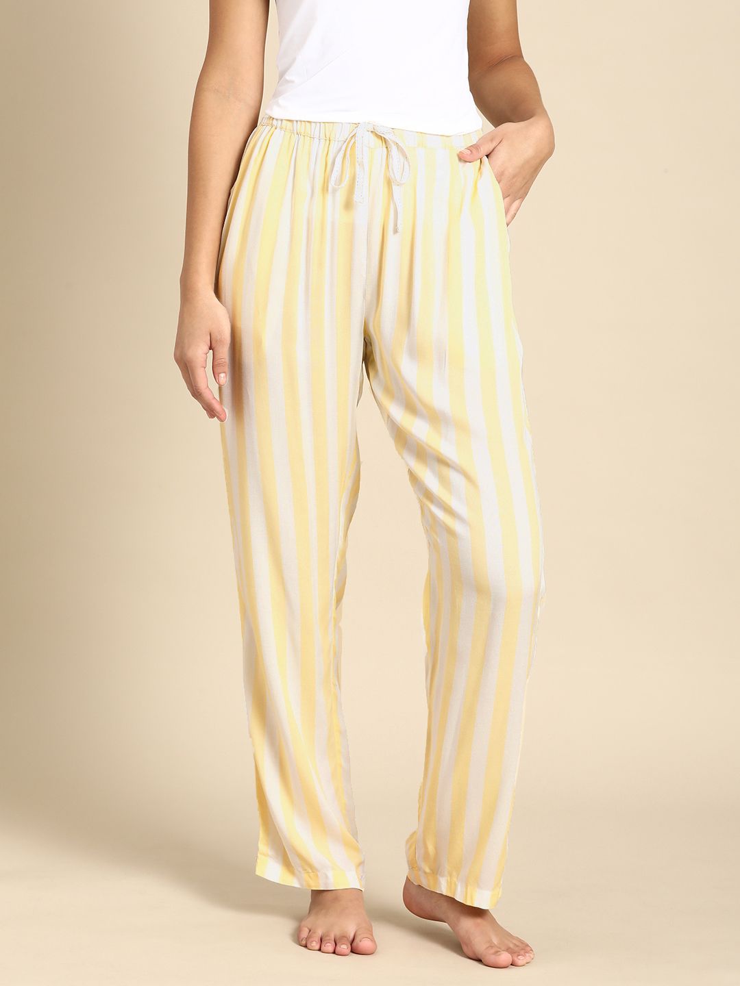 Dreamz by Pantaloons Women Off White & Yellow Striped Lounge Pants Price in India