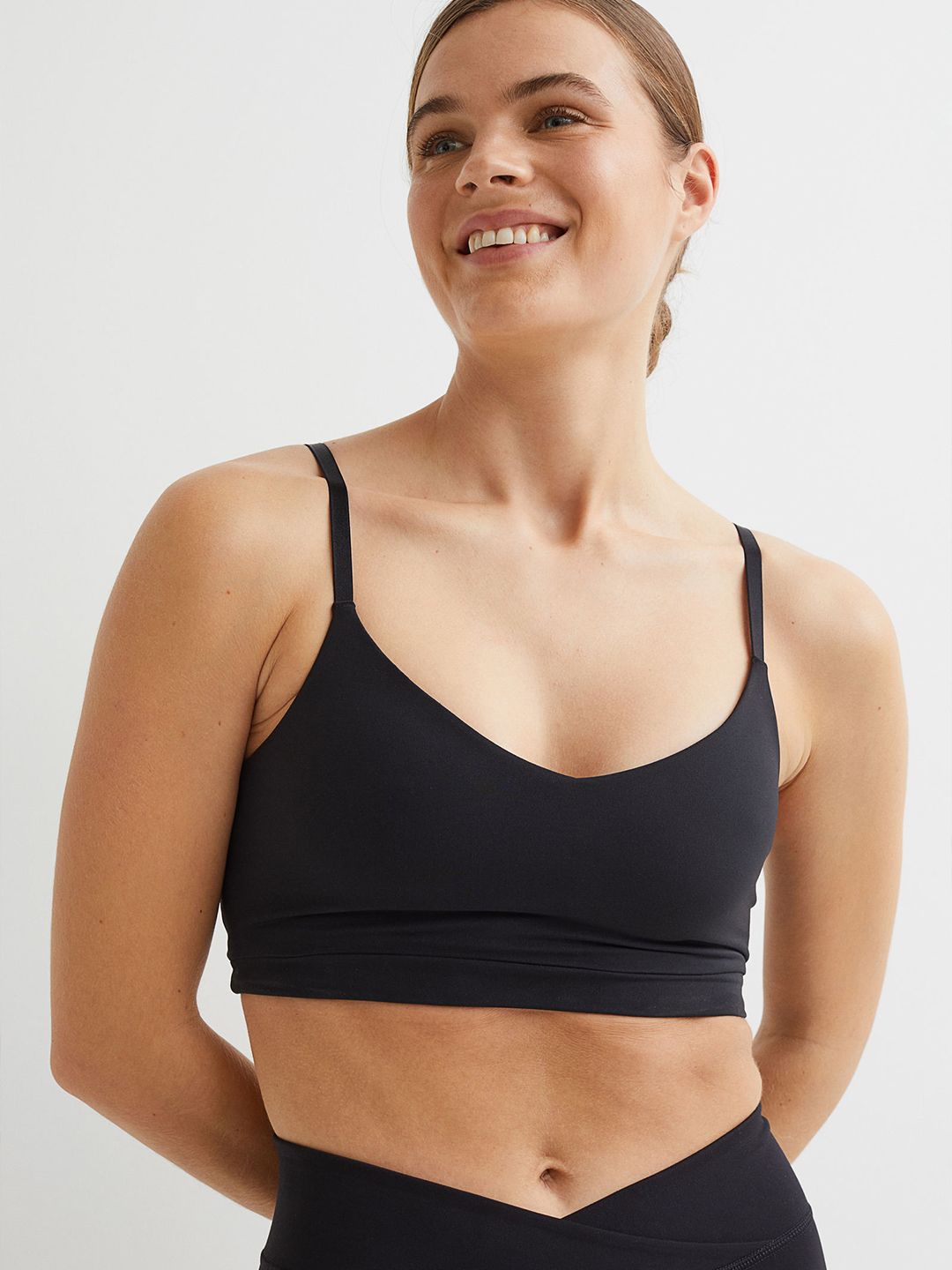 H&M Women Black Solid Light Support Sports Bra Price in India