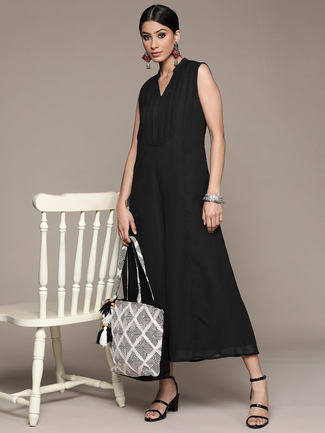 aarke Ritu Kumar Women Black Solid Culotte Jumpsuit Price in India