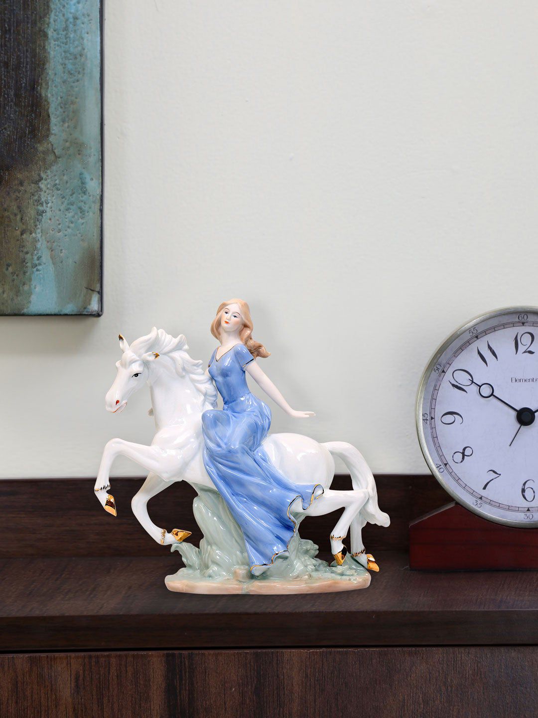 Athome by Nilkamal Blue & White Lady On Horse Showpiece Price in India
