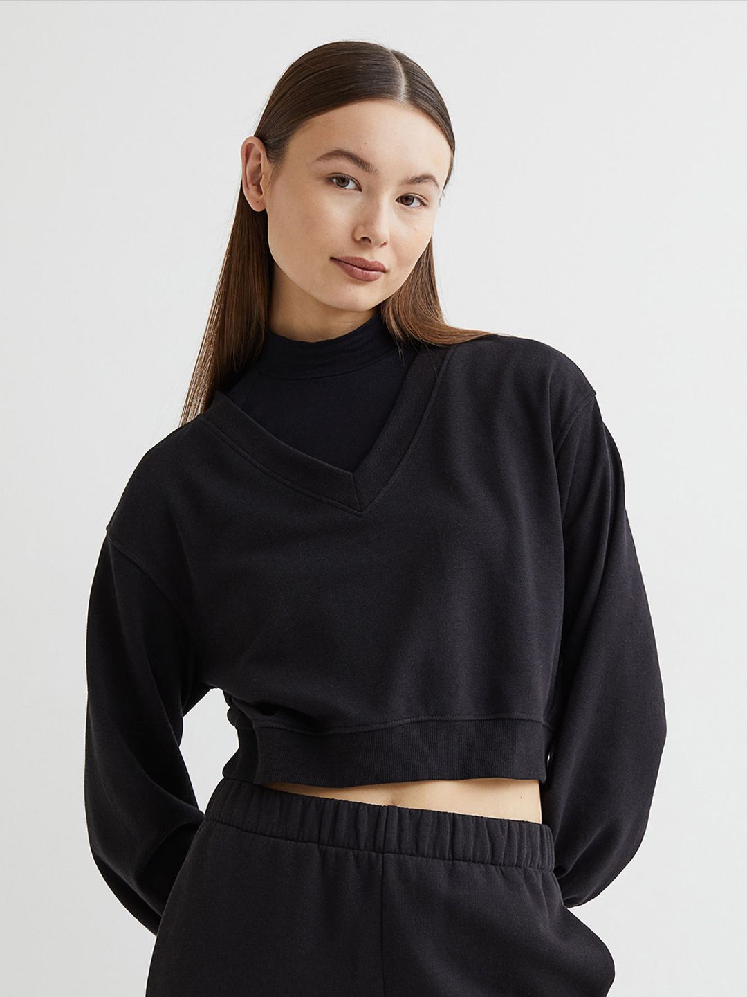 H&M Women Black Solid Cropped Sweatshirt Price in India