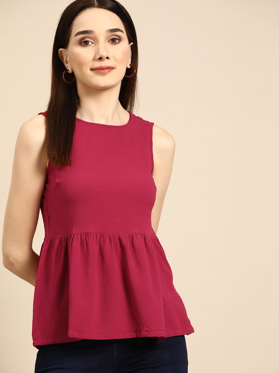 all about you Dark Pink Sleeveless Peplum Top Price in India