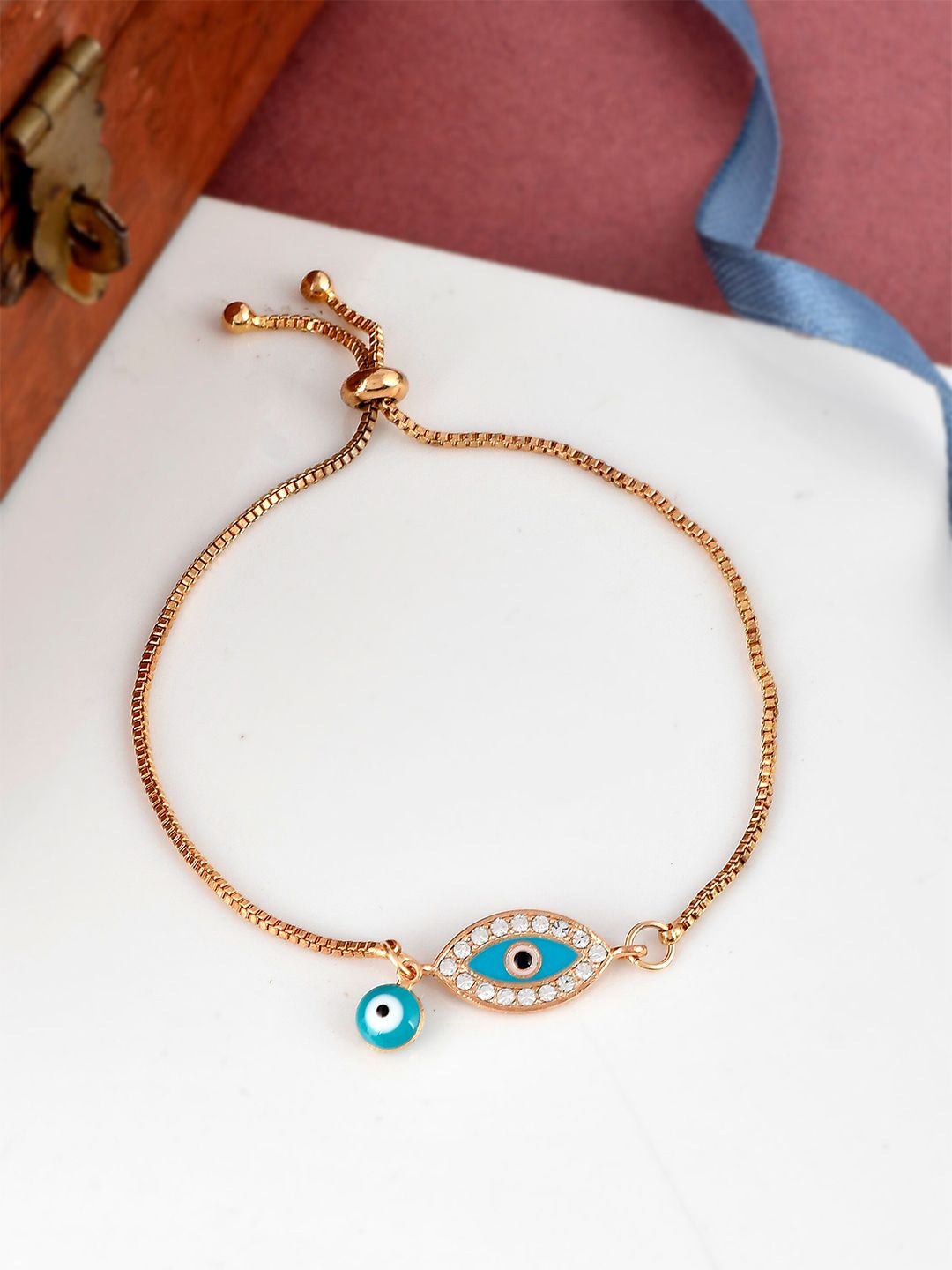 Shoshaa Women Gold-Plated & Blue Handcrafted Evil Eye Wraparound Bracelet Price in India