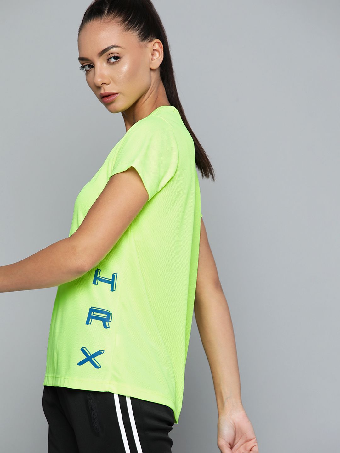 HRX By Hrithik Roshan Running Women Neon Lime Rapid-Dry Brand Carrier Tshirts Price in India