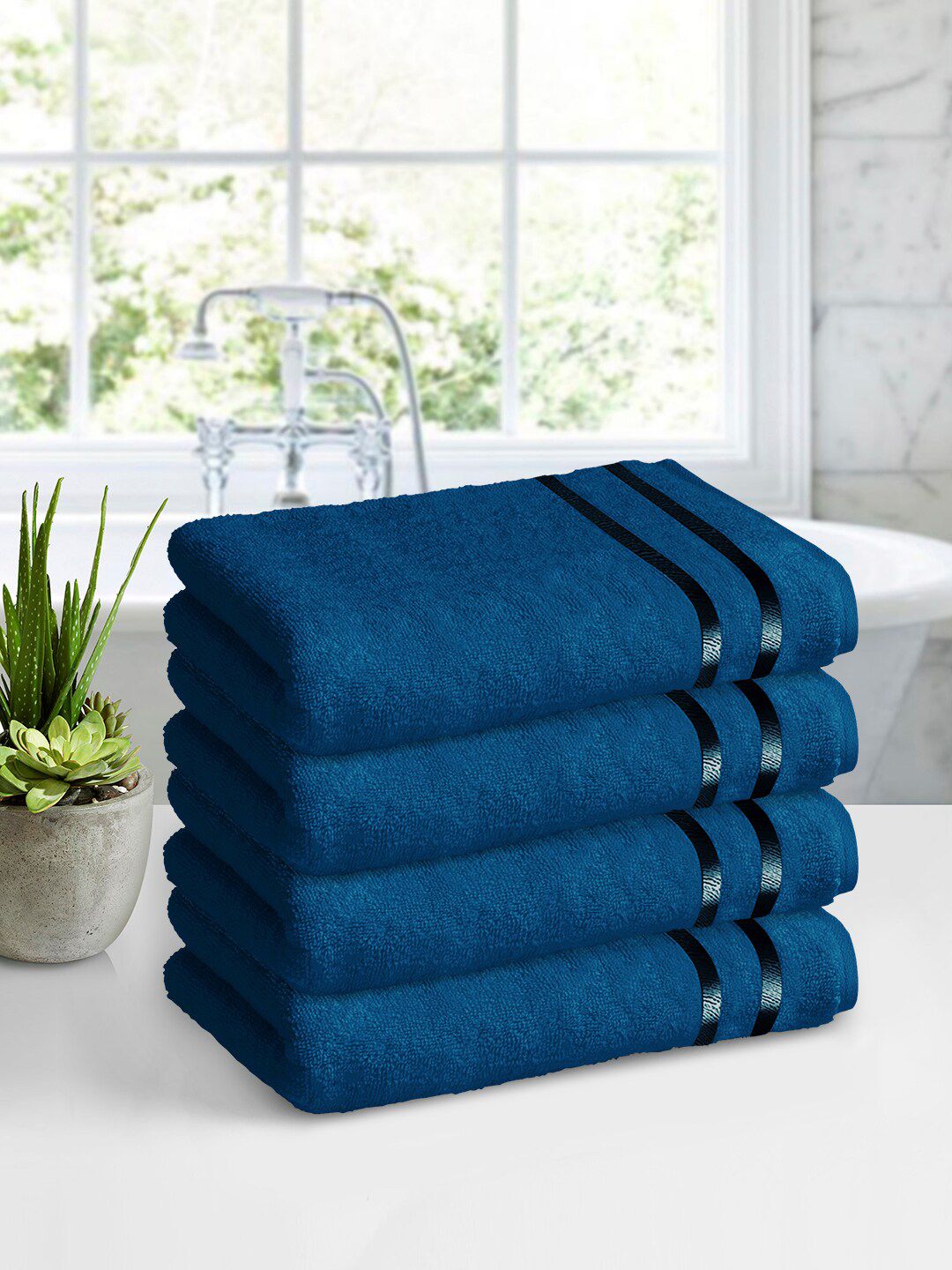 Story@home Set of 4 Blue 450 GSM Pure Cotton Super Absorbent B Bath Towel Price in India
