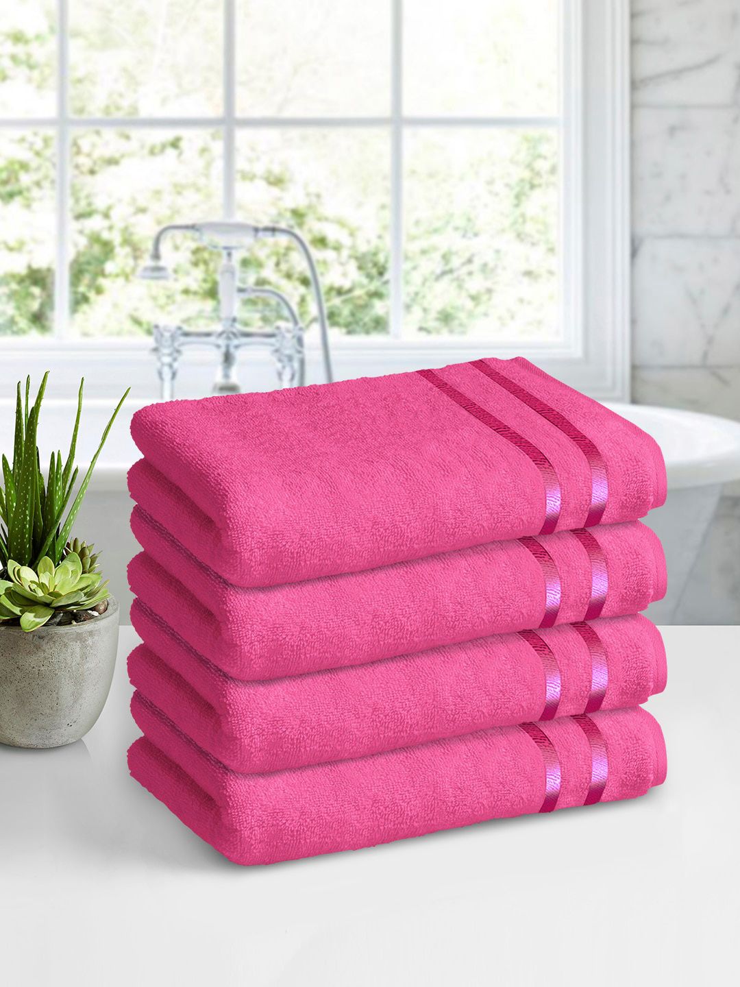 Story@home Pink Set of 4 Solid 450 GSM Bath Towel Price in India