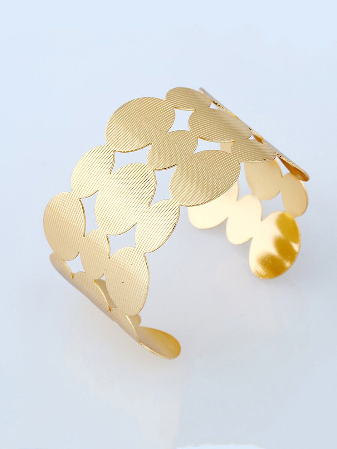 Yellow Chimes Women Gold-Toned Dots Design Cuff Bracelet Price in India