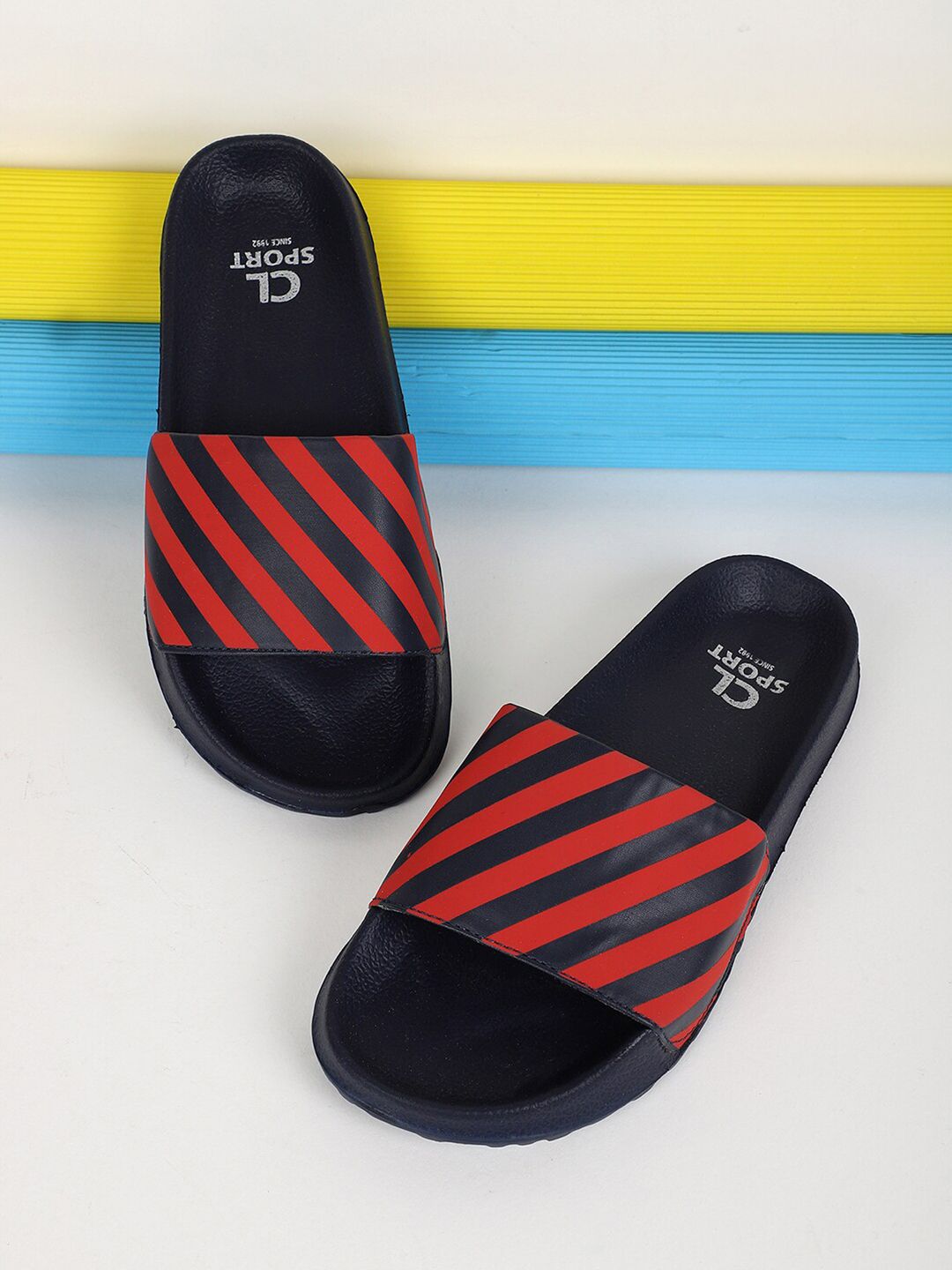 Carlton London sports Women Navy Blue & Red Striped Sliders Price in India