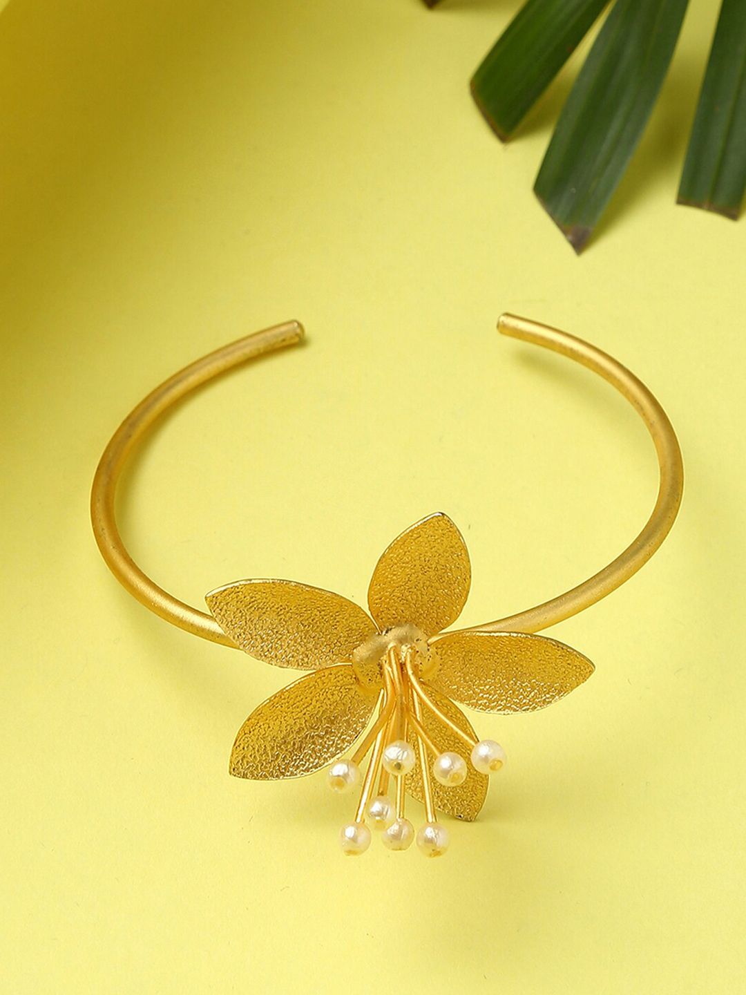 SOHI Women Gold-Toned Floral Kada Bracelet Price in India