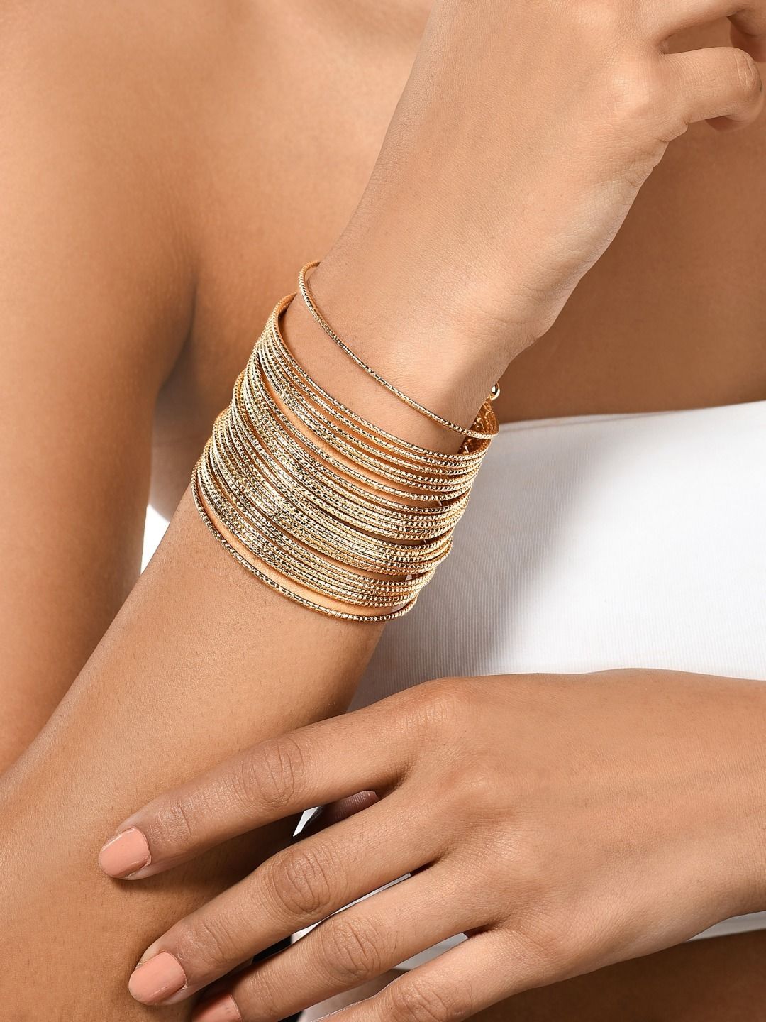 AMI Women Gold-Toned Gold-Plated Cuff Bracelet Price in India