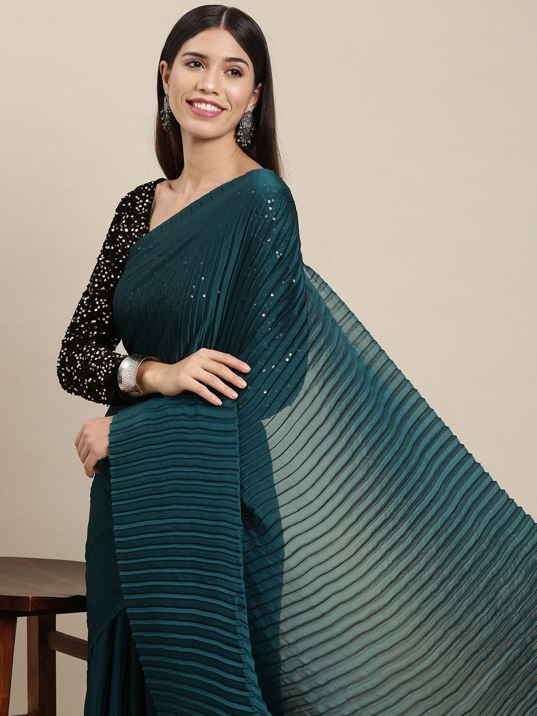 Mitera Teal Green Pleated Sequined Saree Price in India