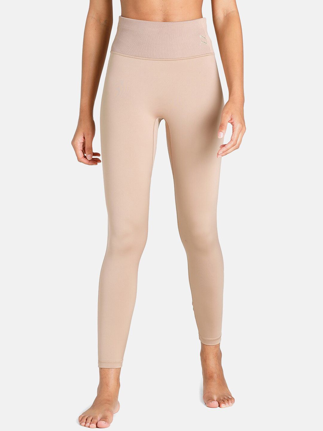 Puma Women Beige Solid Yoga Tights Price in India