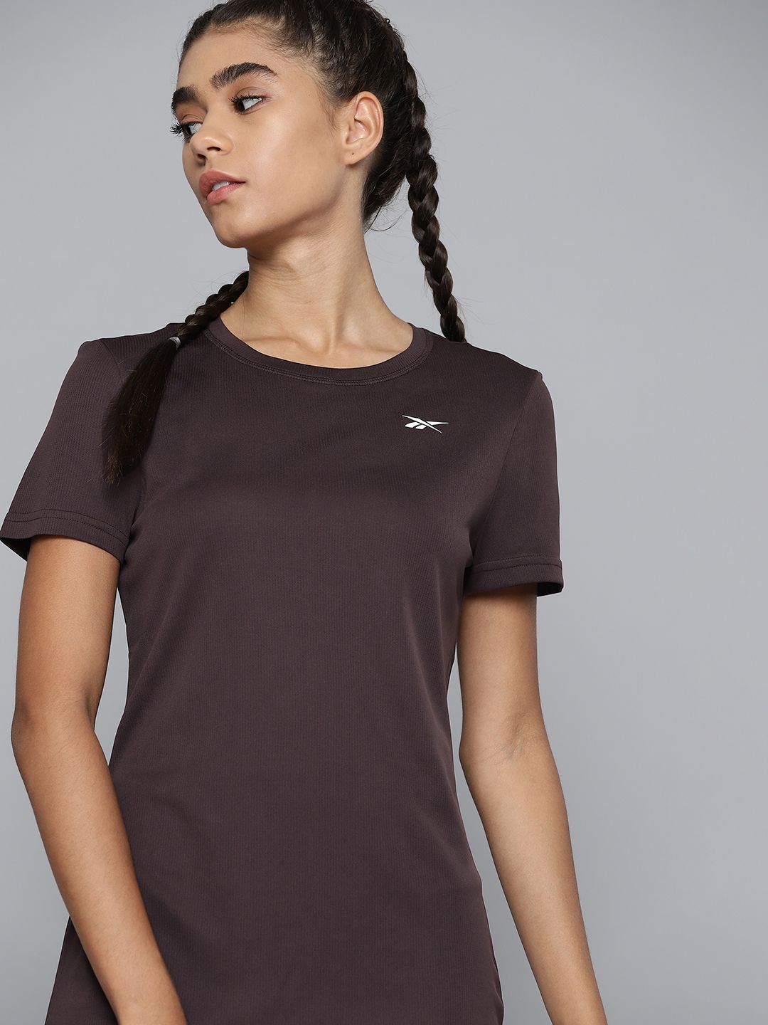 Reebok Women Brown Training or Gym T-shirt Price in India