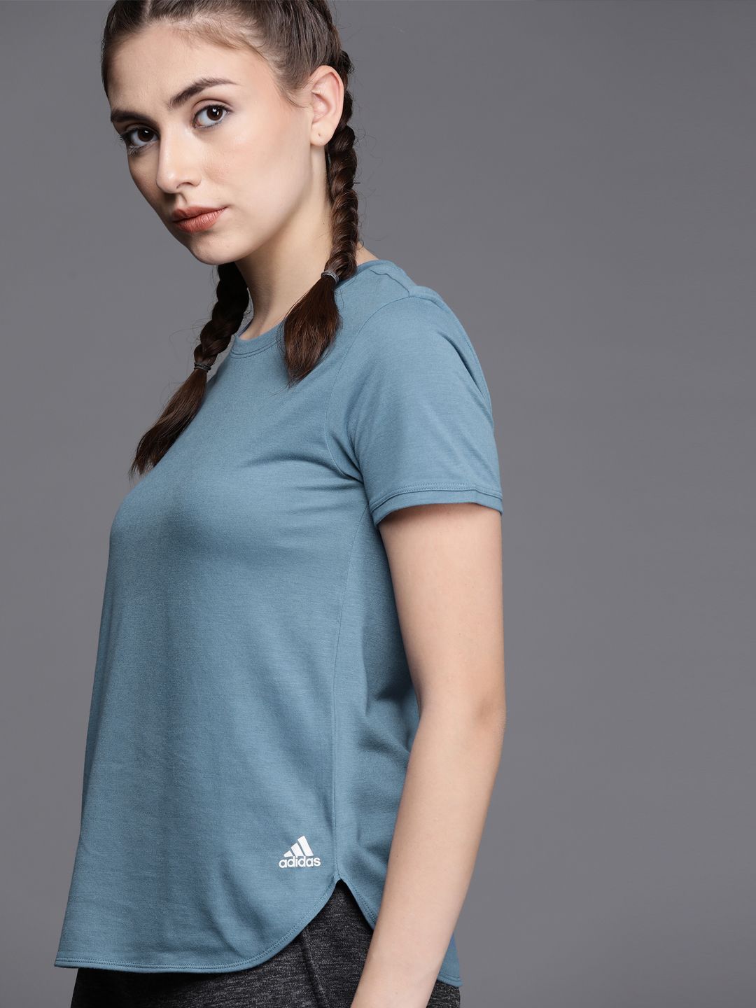 ADIDAS Women Blue Training or Gym Sustainable T-shirt Price in India