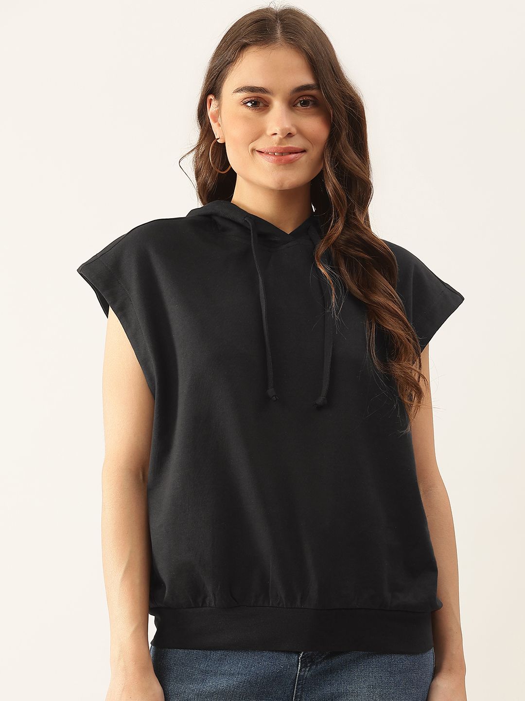 Besiva Women Black Solid Hooded Sweatshirt Price in India