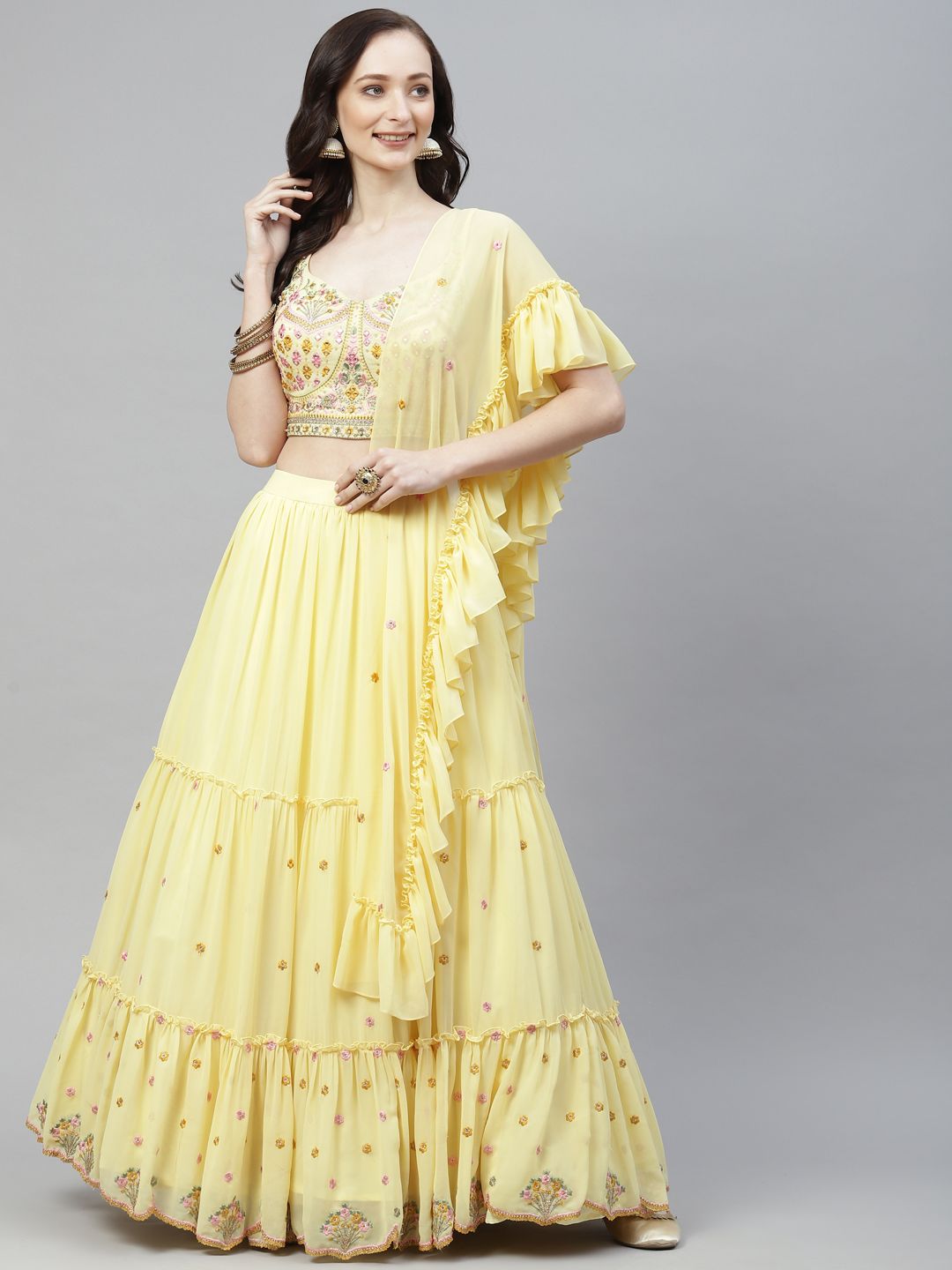 Readiprint Fashions Yellow & Pink Embroidered Unstitched Lehenga & Blouse Ruffled Dupatta Price in India