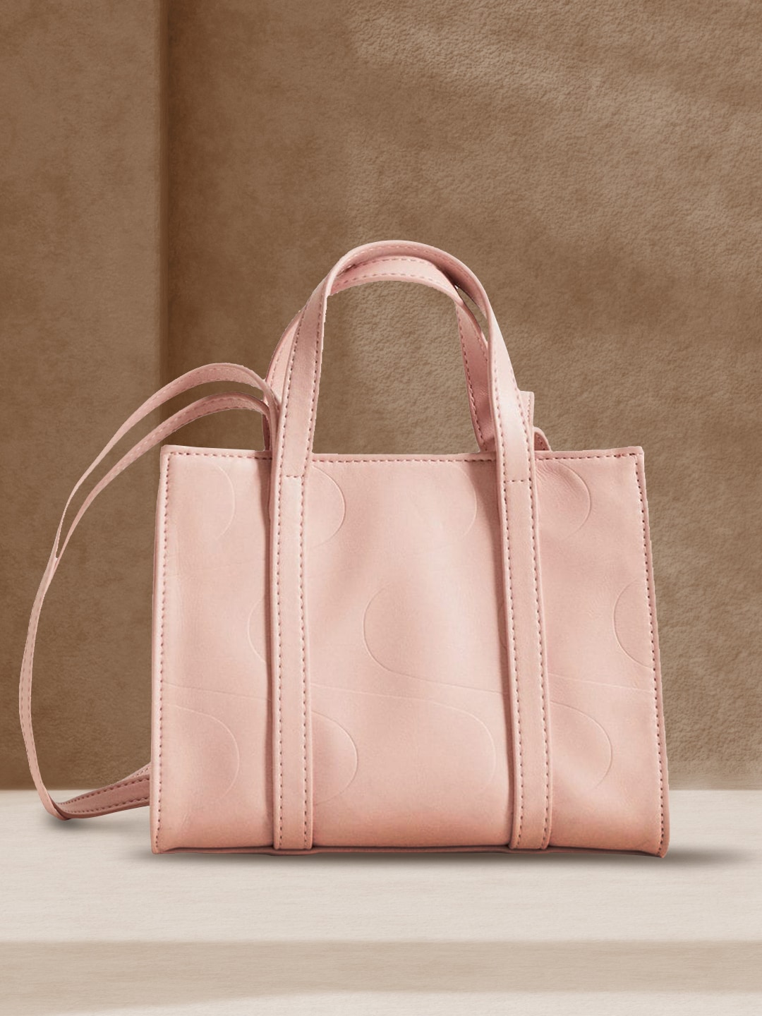 MANGO Pink Textured Structured Handheld Bag Price in India