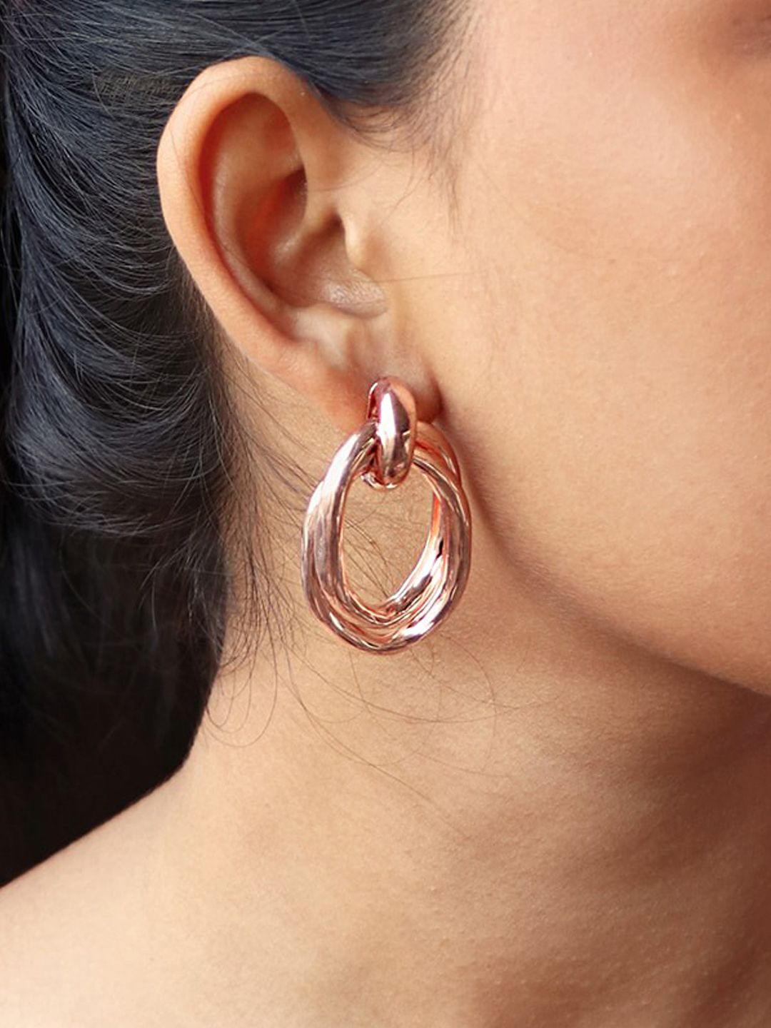 Ayesha Rose Gold-Toned Contemporary Twisted Oversized Stud Earrings Price in India